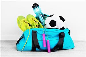 Bright blue sports bag with sneakers, soccer ball, jump rope, and water bottle.